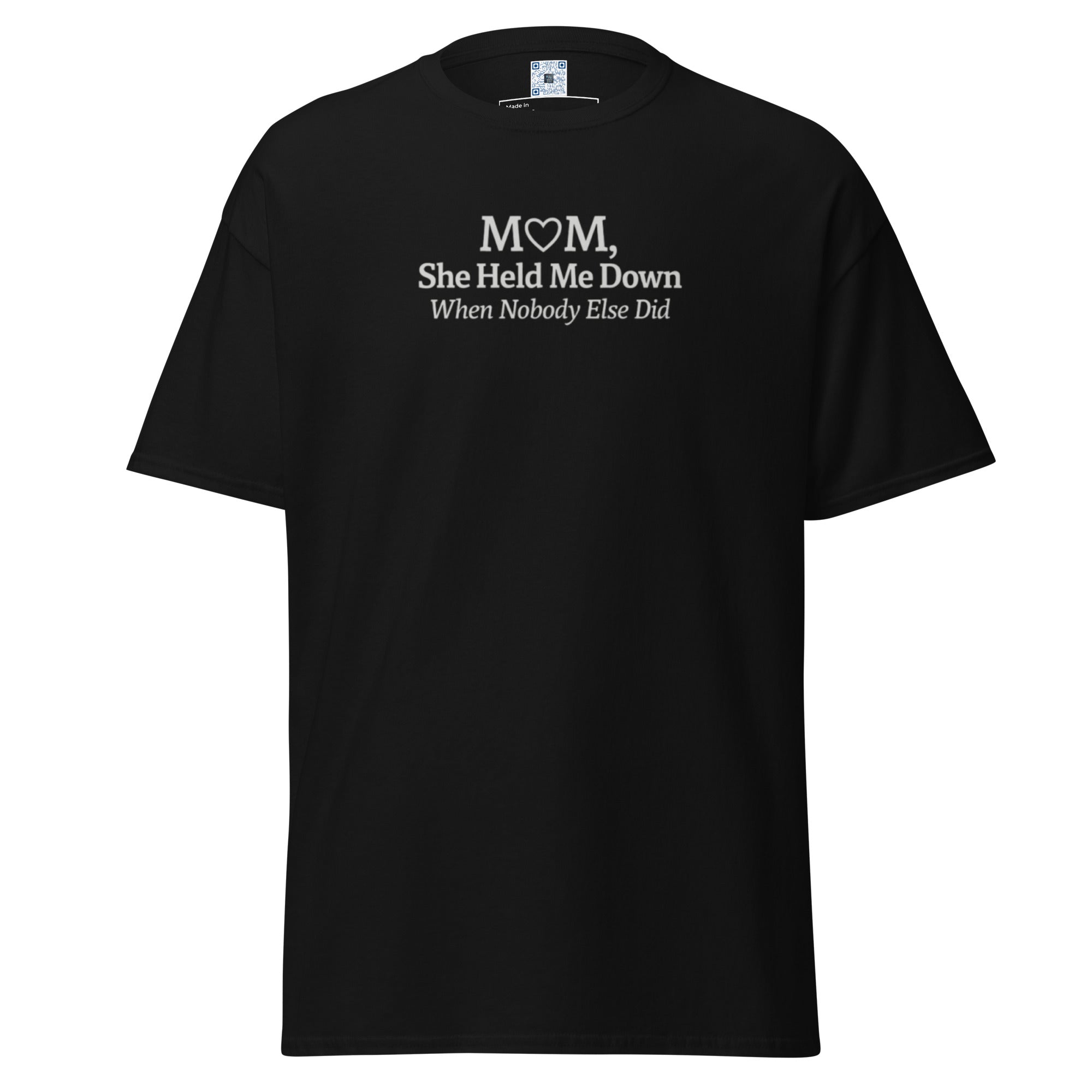 Product mockShop the “Mom: She Held Me Down When No One Else Did” T-Shirt. A meaningful and bold Mother’s Day gift honoring mom’s loyalty and strength.up